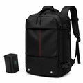 Sac à dos cabine Voyageur Pro Olyneia noir posé avec sa pompe USB de compression sous vide